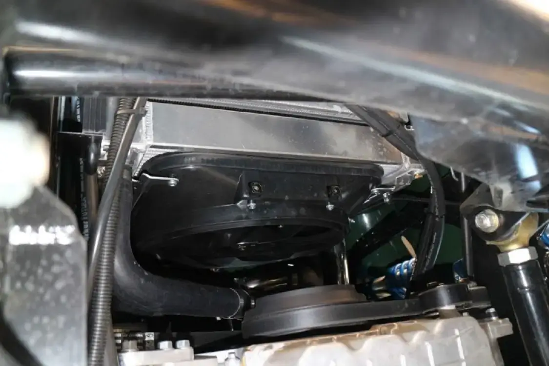 An aluminum radiator and electric fan handle the V-6 diesel’s cooling needs.