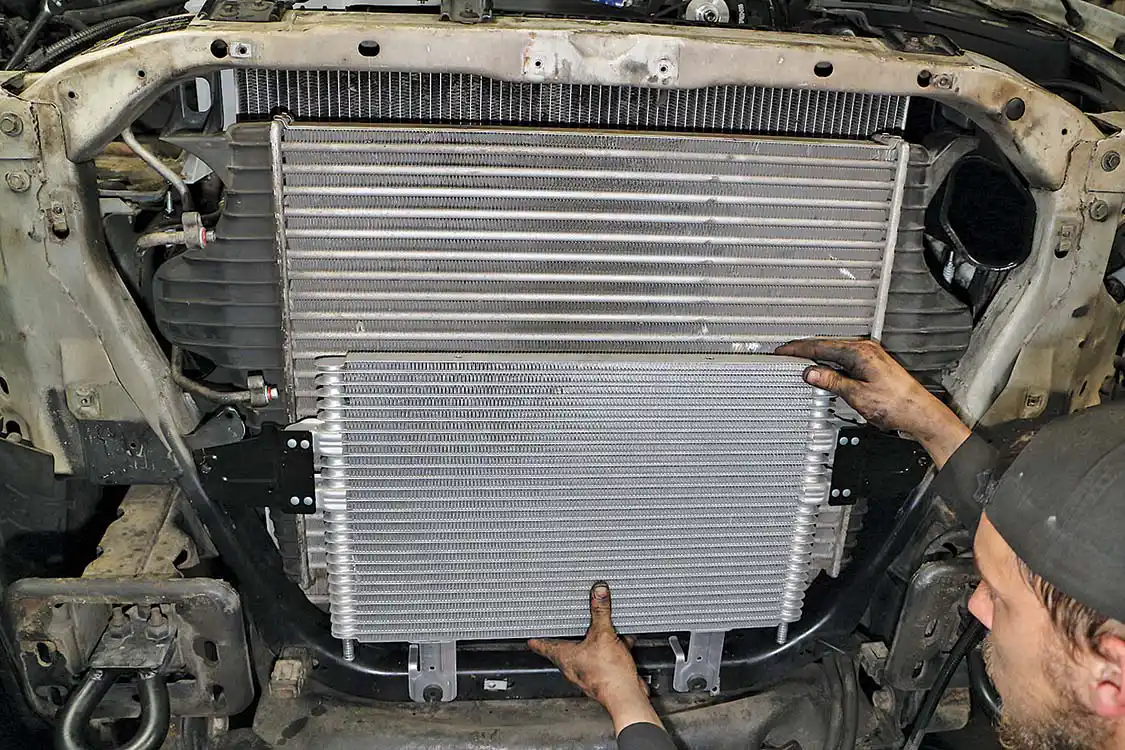 When upgrading a 7.3L to the 6.0L intercooler, the power steering cooler from the 6.0 must be used too.