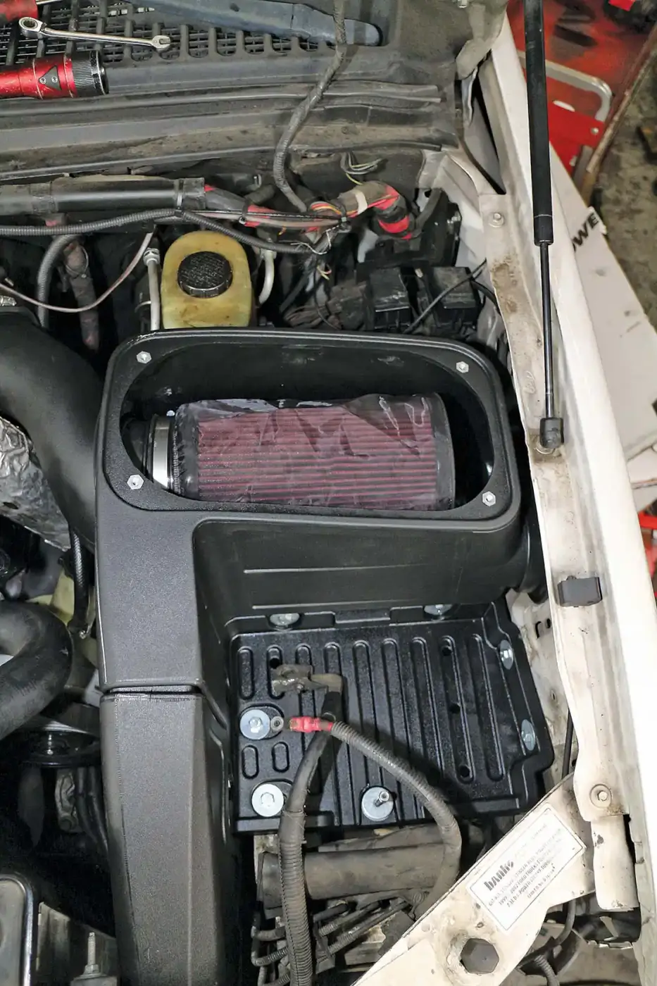 The stock air cleaner housing was swapped out for a much better flowing unit from S&B Filters.