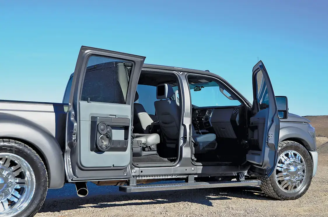 Extensive work was done to reinforce the rear doors which eliminated any sagging when open, which is common with aftermarket suicide door modifications.