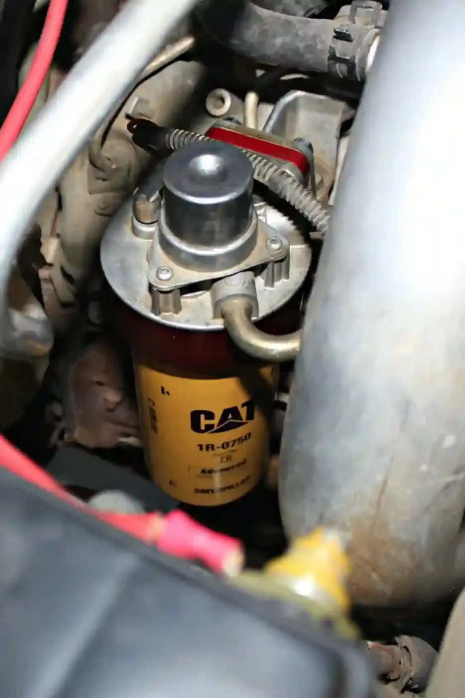 Here’s the completed Cat Adaptor installation. Replacement filters can be purchased for just $20, so it only takes two or three services to get your money back on the initial purchase, plus you can rest at ease knowing the CP3 and injectors are getting quality clean fuel.