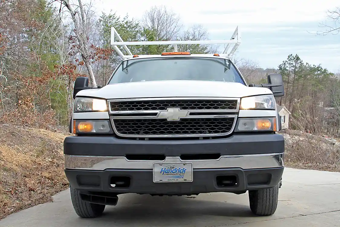 1/2. From the factory GM uses separate bulbs for low beam (photo 01) and high beam (photo 02) operation but does not keep all four bulbs on.