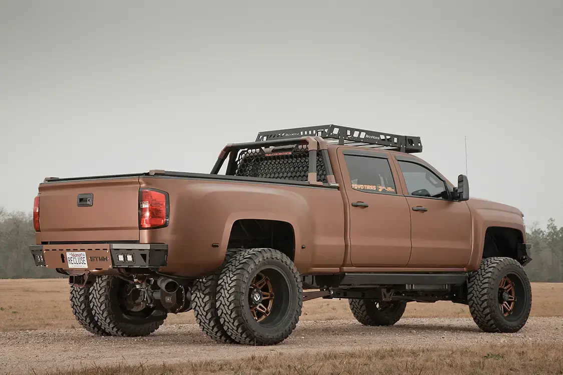Recluse looks as good from the rear as it does from the front. Backbone headache rack, ShowTime Metal Works bumper and RackWorks roof rack all complement each other and add to rugged yet functional look of this truck.