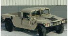 A Hummer H1 in pickup/flatbed two-door configuration. Hummer platforms feature a four-wheel fully independent suspension system complete with heavy-duty springs and hydraulic shock absorbers. Specially designed geared hubs provide a unique gear reduction of 2:1 at each wheel end, doubling the torque output.