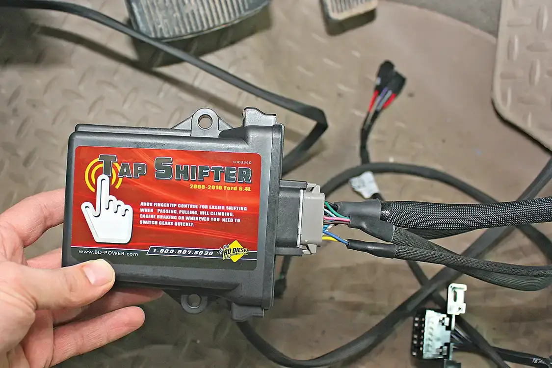 2. BD Diesel engineers developed the first aftermarket Tap Shifter module for the 2008-2010 6.4L Power Stroke. The system offers five preset shift schedules to improve daily driving and towing needs along with full manual shift control when the need arises.