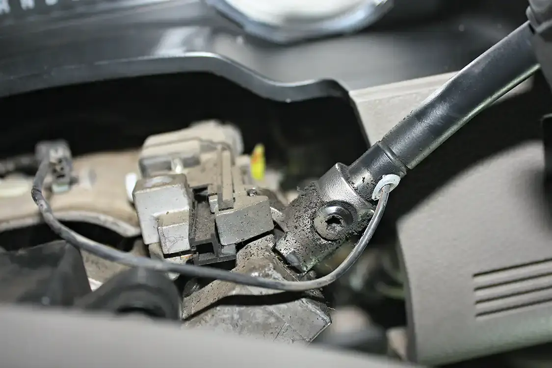 6. With the column cover removed, there’s just one wire connector and a T30 torx bolt holding the factory shift lever in place. Since the new shift lever is genuine Ford, it will go back in place of the stocker using the same wire connector and bolt. (If installing the BD VVT Exhaust Brake module like we are, the shift lever will piggyback both the factory and Tapshift harnesses.)