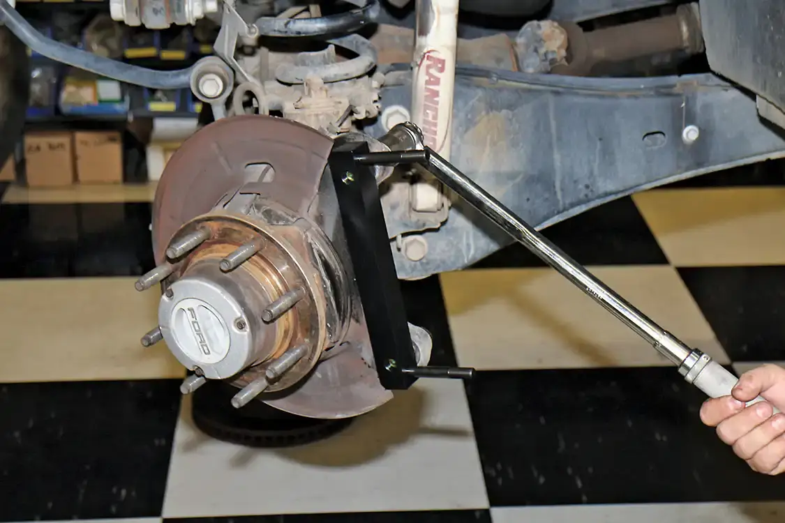 5. Here you see one of the front caliper brackets from Wilwood: First the brackets are installed, then the brake rotors. Finally, the calipers are dropped onto the caliper bracket and the caliper center spacing on the rotors is checked. Once the correct caliper shim pack has been determined, put lock-tite on the caliper bracket bolts and torque the caliper brackets to spec. 