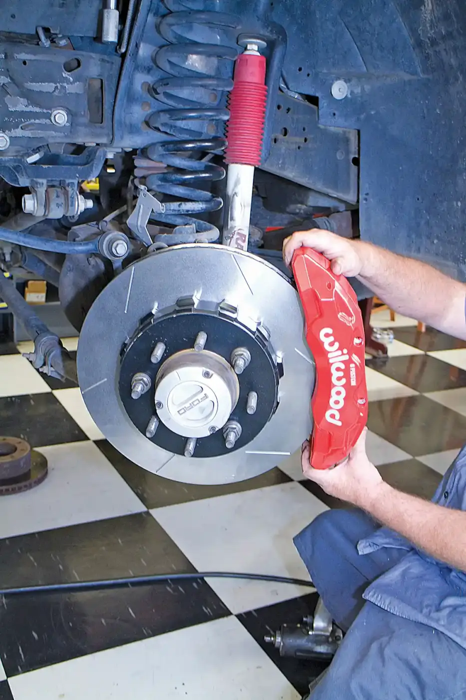 7. The caliper is installed, the center to the rotor tested. If it is off center, you will need to recheck the shims on the caliper bracket mount.