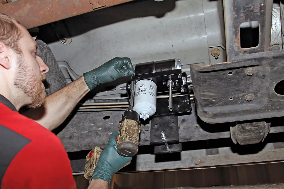 17. Grubb mounted the pump as close to the cab as possible without touching it-- as that would create noise problems and vibration.