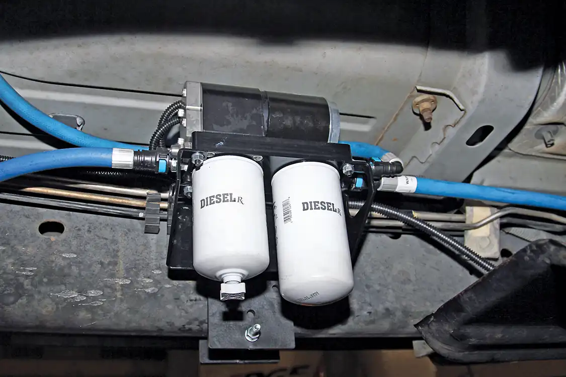 23. The completed AirDog pump and filter system is mounted high on the inside of the frame rail where it will be protected from road or construction site debris, yet filters will still be easy to replace.
