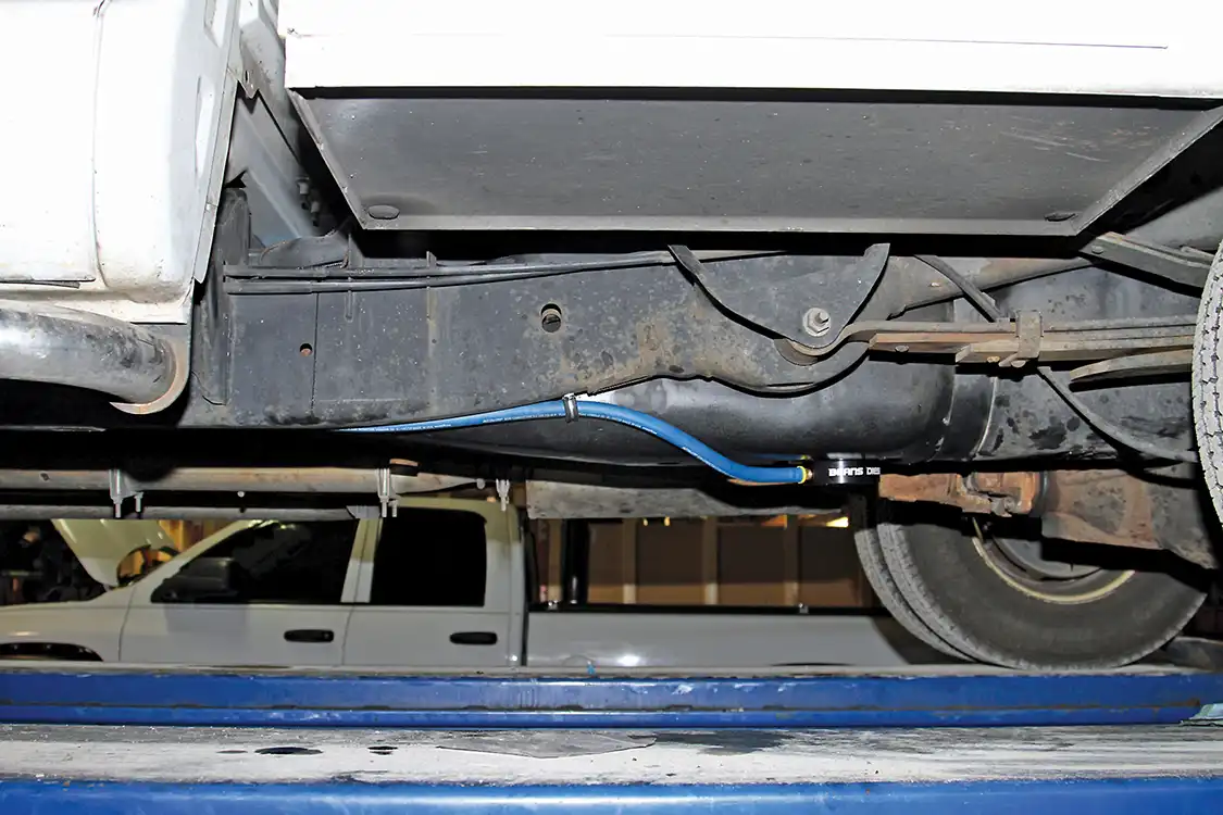24. Grubb secured the hose running from the sump to the AirDog with an insulated clamp, mounted to the frame to keep the hose from getting snagged from below.