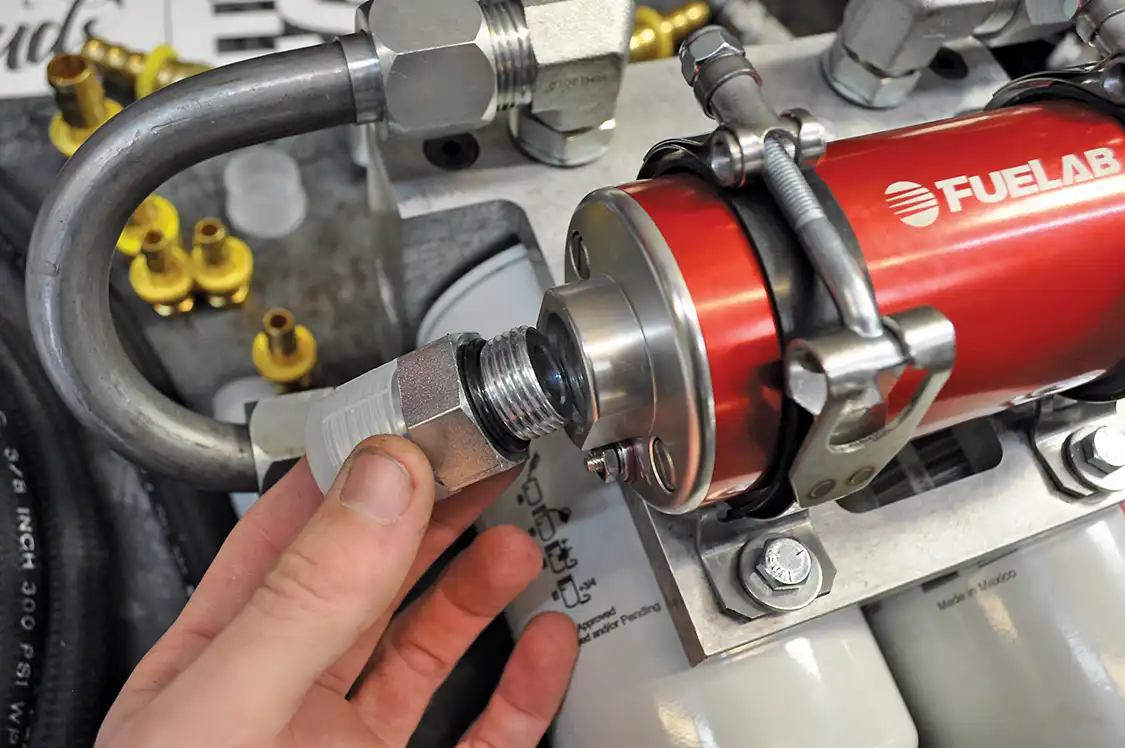 6. The kit includes a water separator as well as a 2-micron filter. It takes a supply from the tank and first sends it to the water separator. Fuel then goes through the Fuelab pump to the filter.