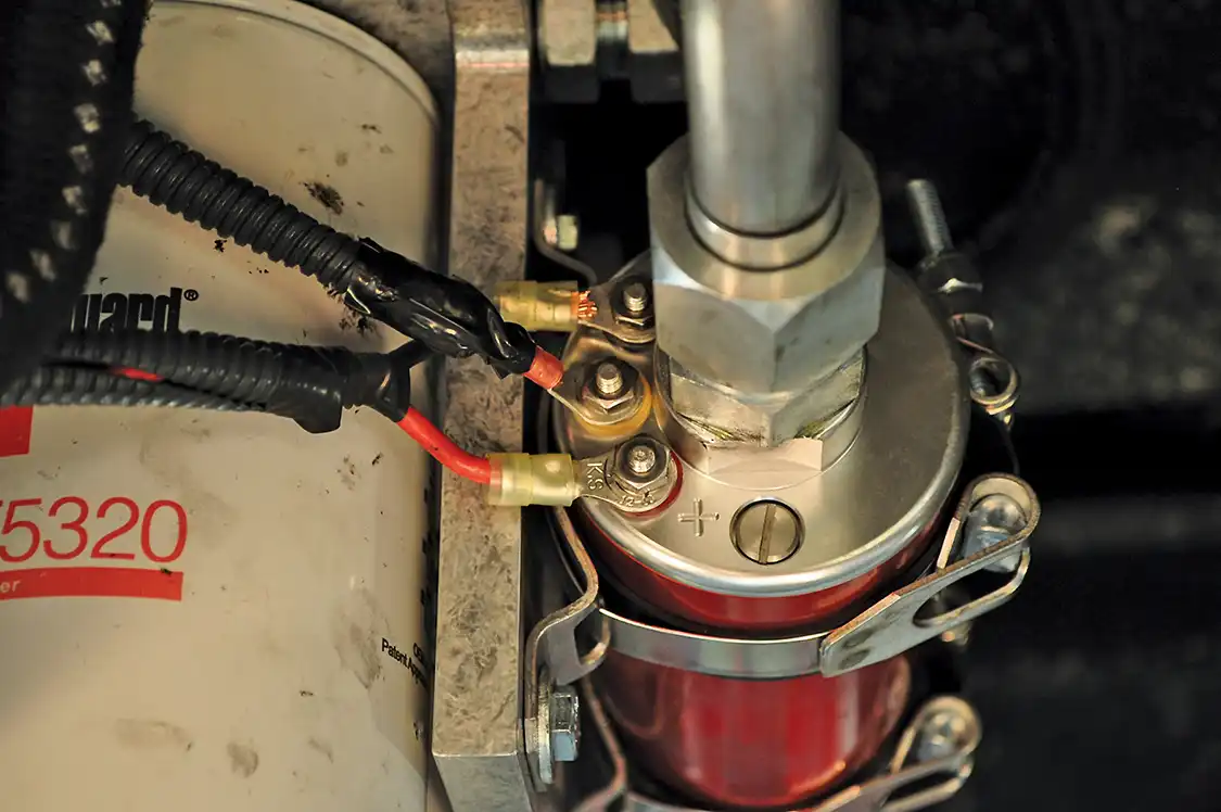 12/13. Wiring was extremely simple as the Ford comes from the factory with a small supply pump. All Lezama needed to do was cut the factory plug off and wire it to the new pump. However, the Fuelab pump has two speeds: high and reduced. Kenneth from High Speed Performance advised us to simply ground the speed selector wire. This would put the pump in reduced power mode. With the injectors we are using-- 175/30's--that will be all the fuel we'll need.