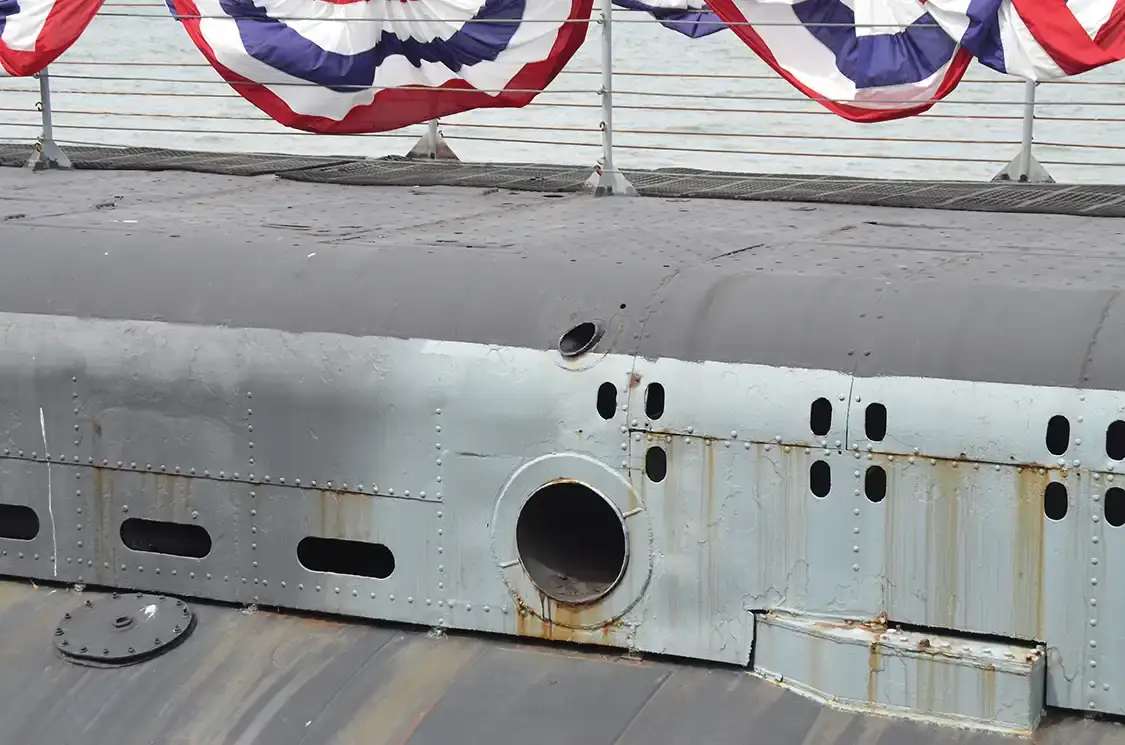 The exhaust exits out this massive opening.