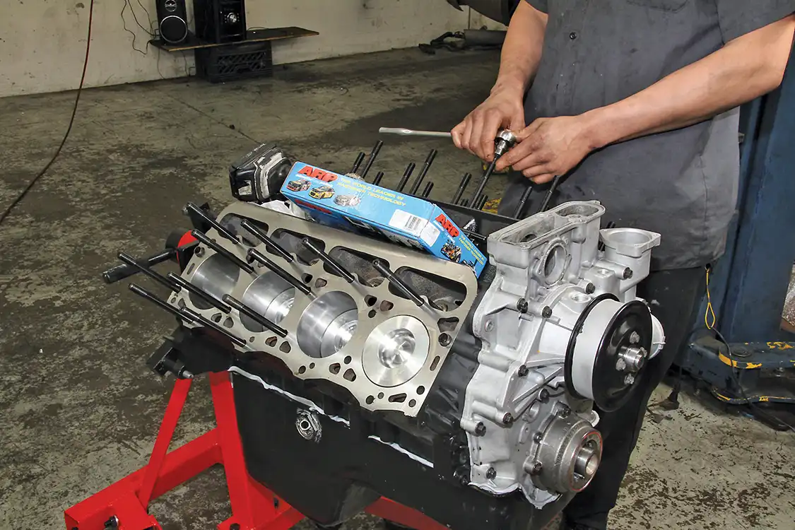 Here you see an ARP head stud kit being installed on a Ford 7.3L diesel.