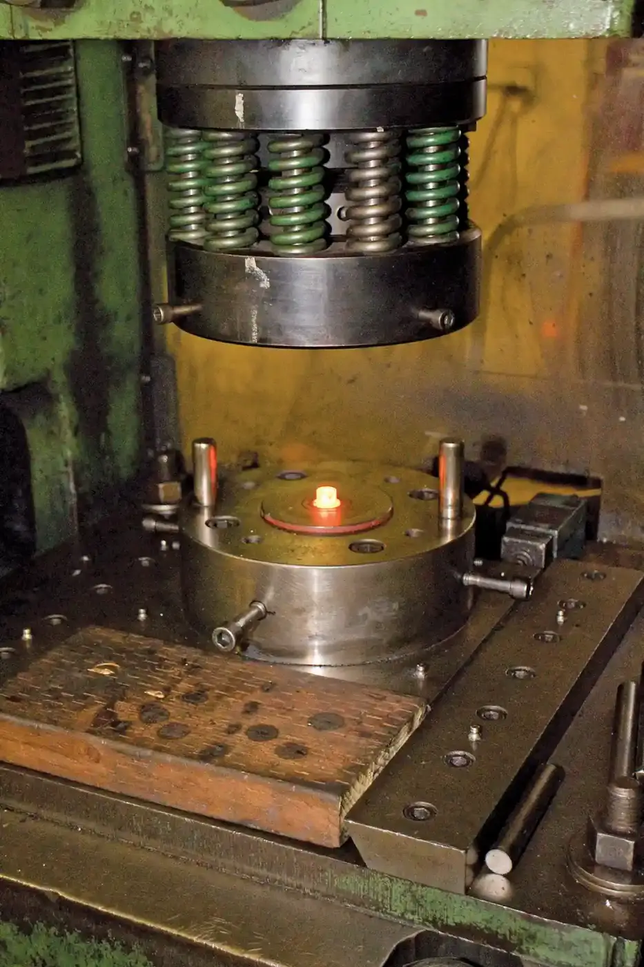 Hot heading involves heating the steel blanks to a precise, red-hot temperature and then putting tons of pressure to form the heads. This process is used for more complicated bolt head designs.