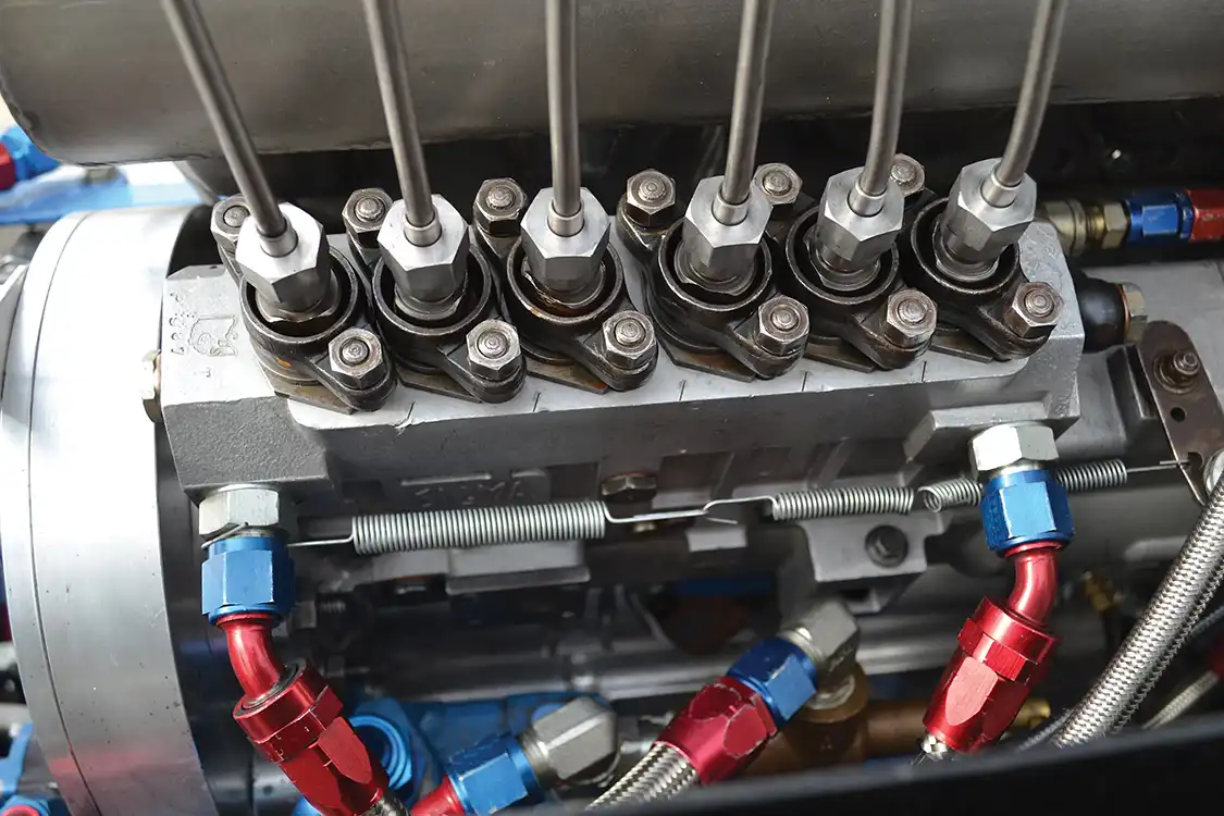 The factory Bosch P7100 is long gone, and a 2,000cc-capable Sigma pump—originally designed for locomotive applications—is in its place. Jason runs the Sigma at around 1,300cc of fuel and 40 degrees of timing to make the best reliable power.