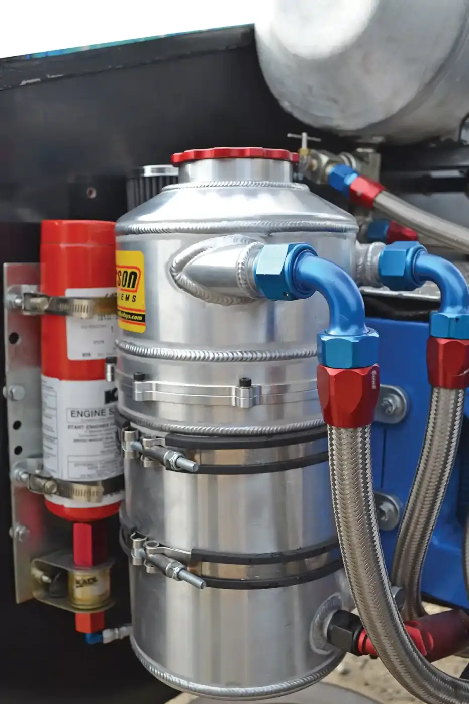 Oiling is a vital part of an engine's longevity and the stock oiling system doesn't much like three turbos or 7,000 rpm blasts. A wet sump oiling system from Haisley Machine was installed and holds a whopping total of four gallons. It pumps engine oil at 100-110 psi when engine speed is up, while the turbos get a separate tank at 50 psi to keep their bearings alive.