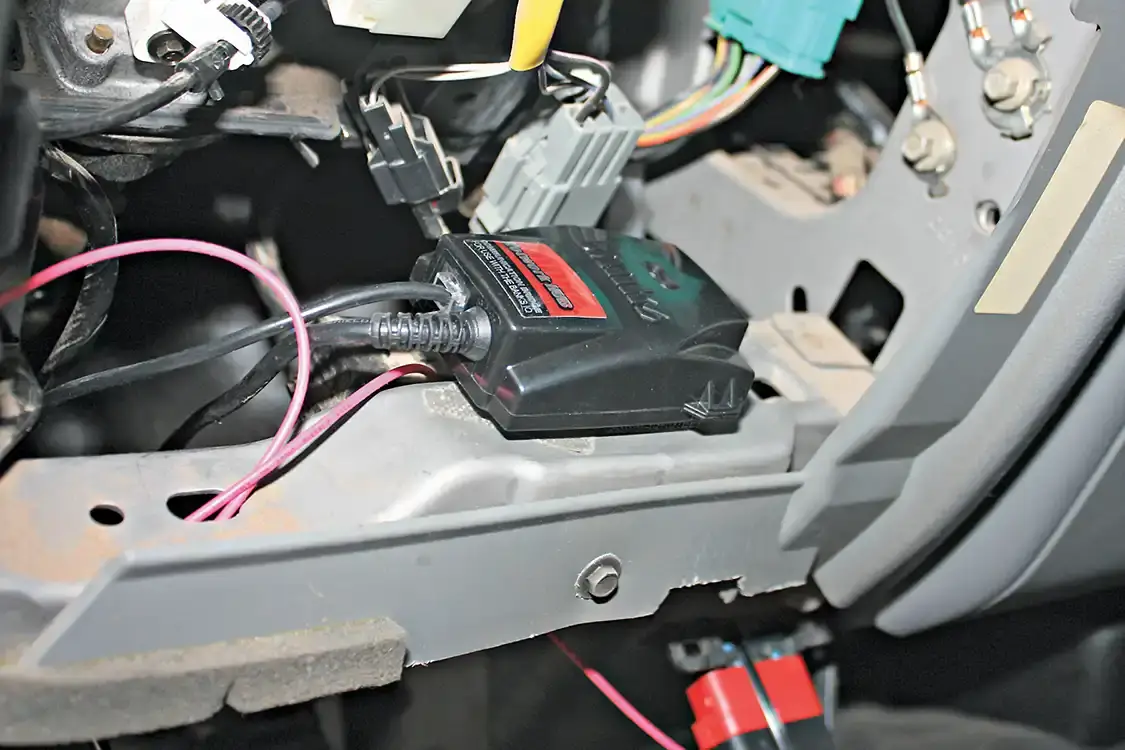 12. The Banks Network Hub is installed under the dash and will help send data sent from the OBD-II port, EGT probe, and Six Gun Tuner to the iQ monitor. You’ll also need to tap into a key-on fuse 12-volt power source, which will be located within the fuse panel under the dash.