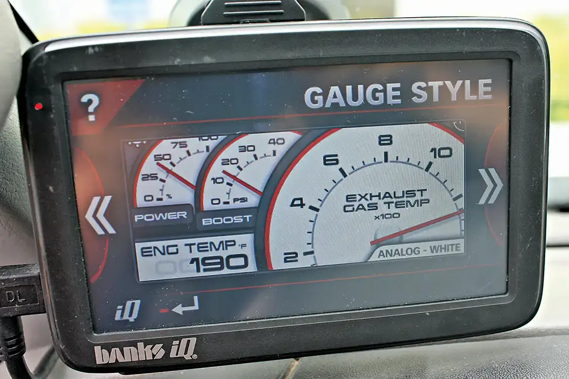 14. The iQ has multiple one-of-a-kind gauge displays you can choose from depending on your own preferences: The white face analog gauges give that old-school look with the new-school technology. You can also select the background colors or watch a Fuel Mileage Calculator screen to help monitor mileage driven, price per gallon, estimated mileage, and cost per mile.