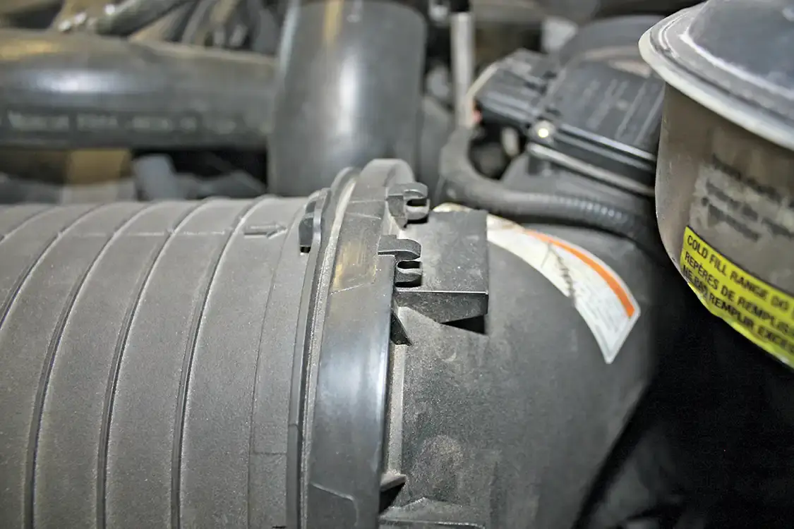 2. The factory air box uses a large oval-shaped paper filter that does its job well; however, its design makes servicing a bit of a hassle, and replacement filters can be quite expensive. It’s also common for the metal clips that help seal the box to break or come up missing, allowing unfiltered air to enter the turbo.