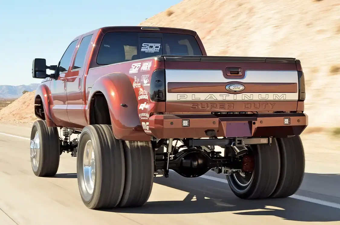 With the combination of the lift, body work, Fusion bumper and custom hood, this truck looks like it's ready to go get the job done.