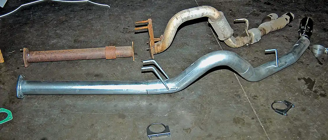 Stock exhaust next to the Diamond Eye kit.