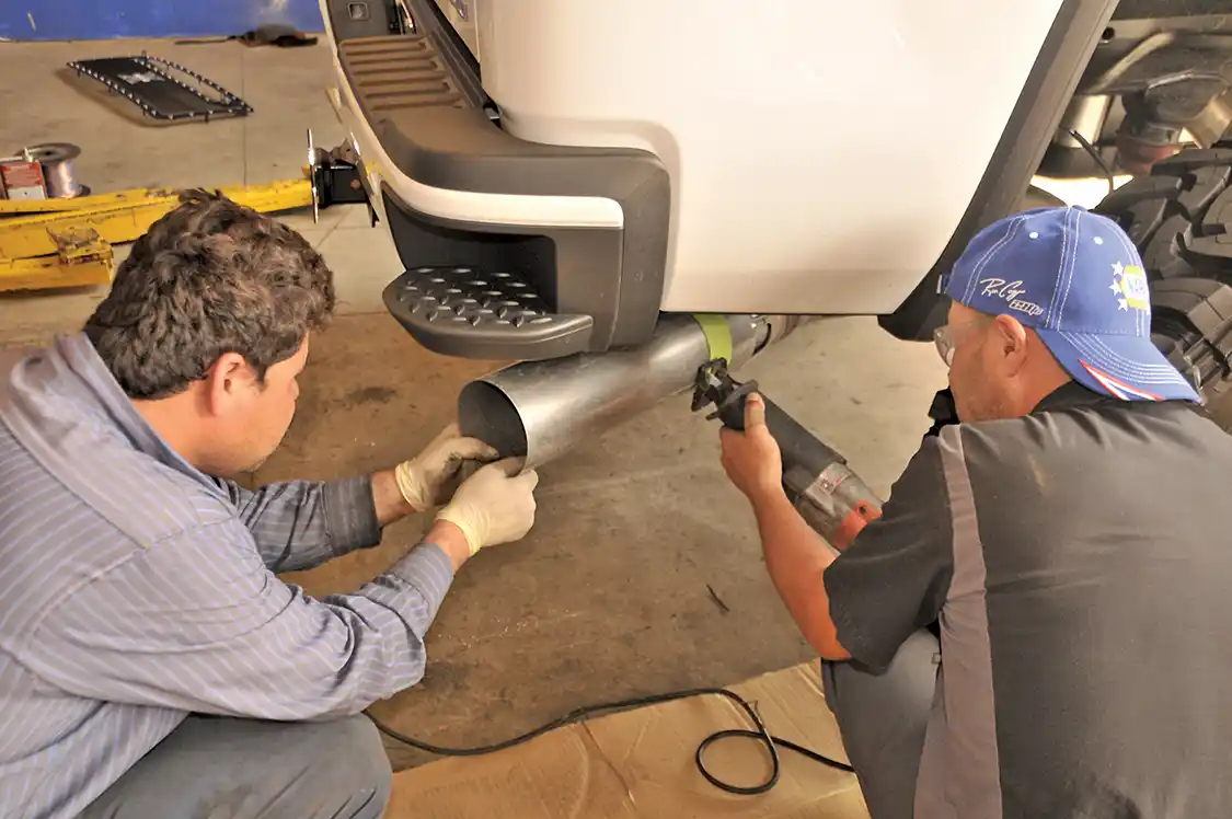 27. Lastly, Javier wanted a cool exhaust tip but didn't want to change the factory exhaust; he got a tip from <a href="https://www.rollingbigpower.com/index.html">RBP</a> and then talked to the <a href="https://www.chevrolet.com/">Chevy</a> dealer about exactly how much of the factory exhaust he could cut off to make the RBP tip fit. After the trimming, the factory exhaust was given a nice sanding down to take away sharp edges.