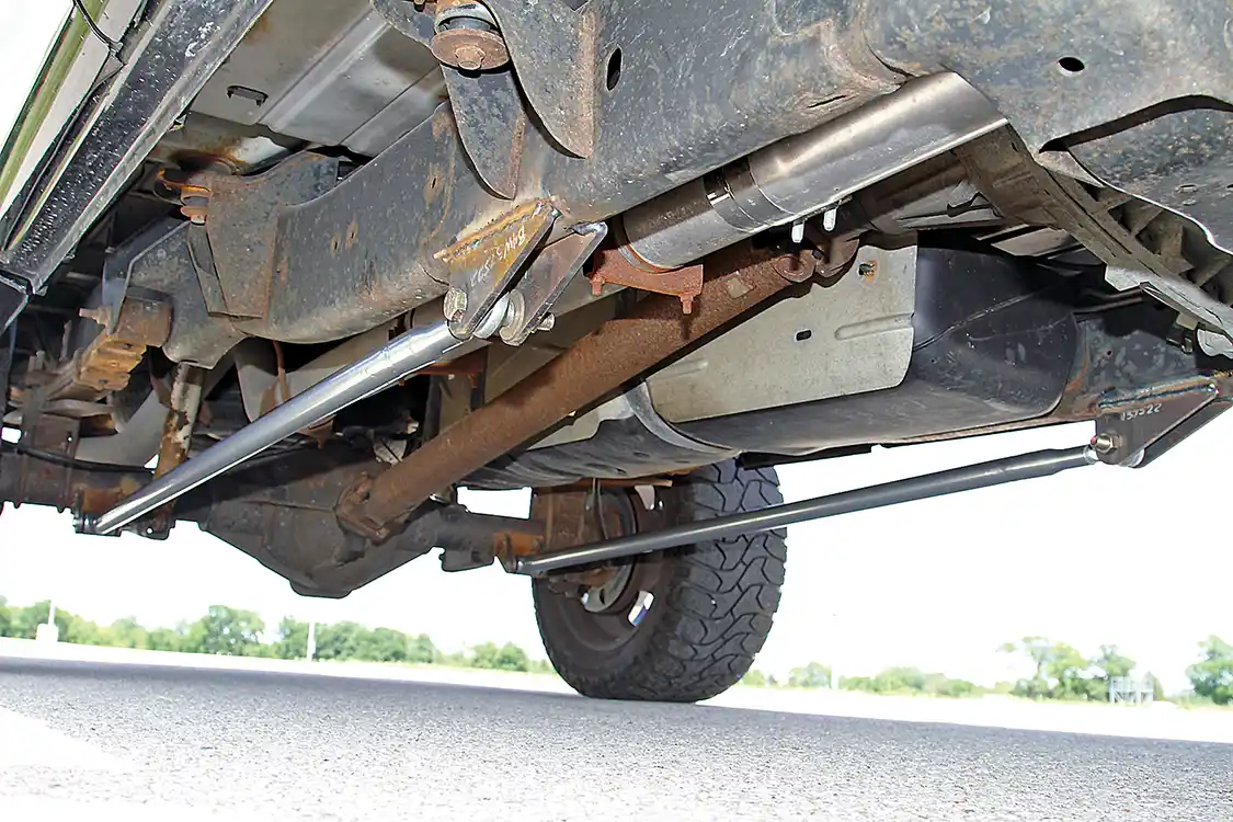  To keep the rear axle from trying to twist itself out of the chassis, Patrick Rector built this set of custom traction bars that link the axle tubes to the frame.