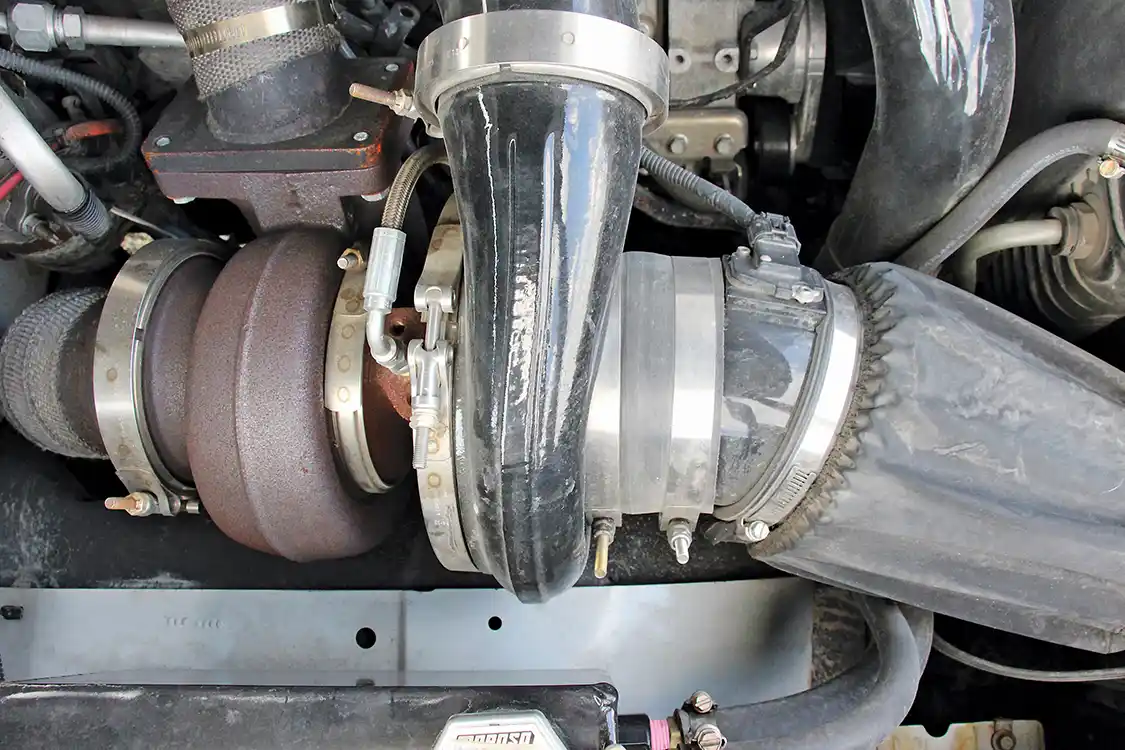 A compound turbo arrangement from Wehrli Custom Fabrication makes the truck extremely fun to drive. The setup utilizes a T6 flanged billet compressor wheeled BorgWarner S475 as the atmospheric unit (shown).