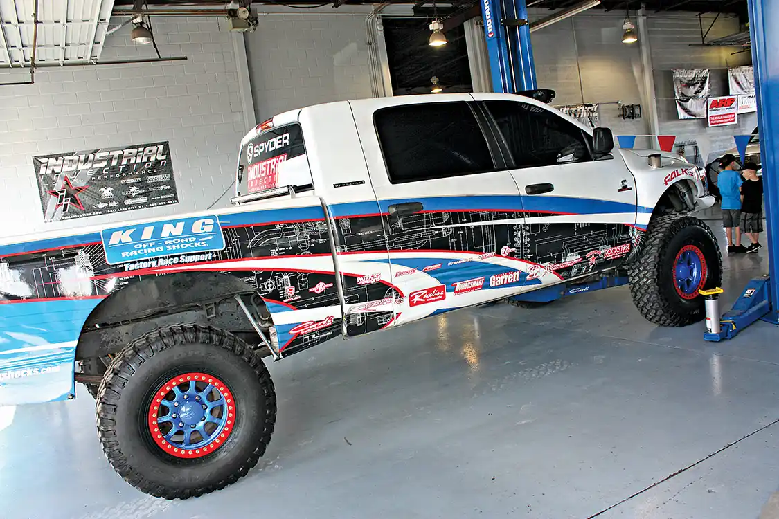 When running racer support for a major desert race team like King Off-Road Racing Shocks, you’ve got to have the right truck for the job—and we’re willing to guess at 766hp this Dodge can get it done. Owned by Kellan Meadows of Tehachapi, California, the truck runs King 3.0 shocks, long travel Carli Suspension, Industrial Injection dual CP3’s, 250hp injectors and a Phat Shaft 66/GTX4718 compound turbo kit, all backed by a built 48RE transmission.