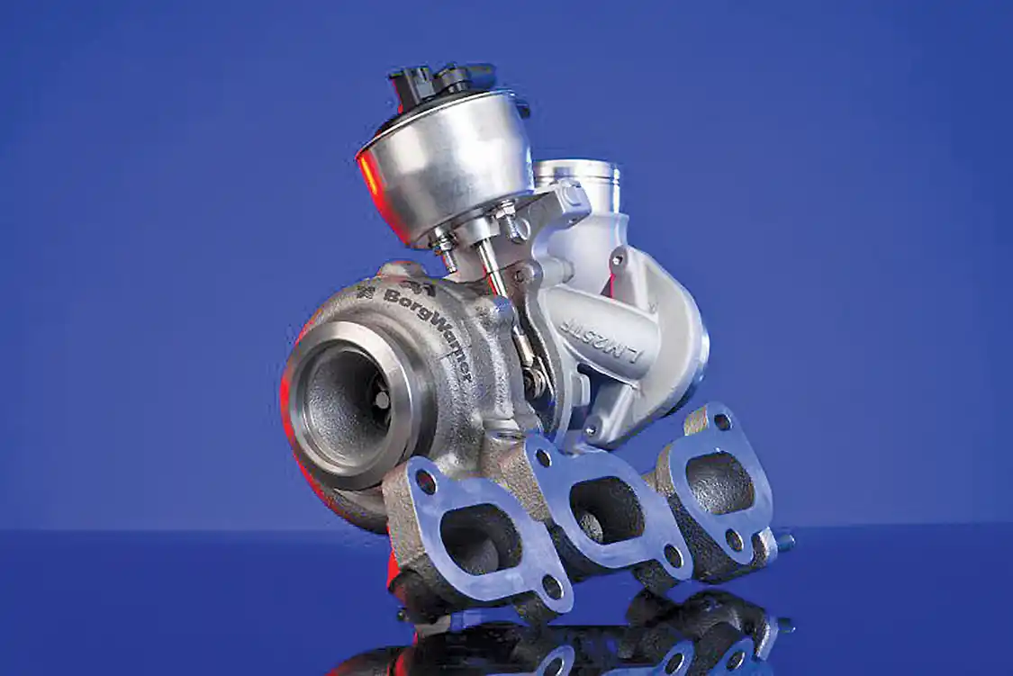 Engineered to improve fuel economy and reduce emissions, BorgWarner's advanced VTG turbocharger boosts the performance of Volkswagen's newly developed 1.4-liter three-cylinder diesel engine. (PRNewsFoto/BorgWarner Inc.)