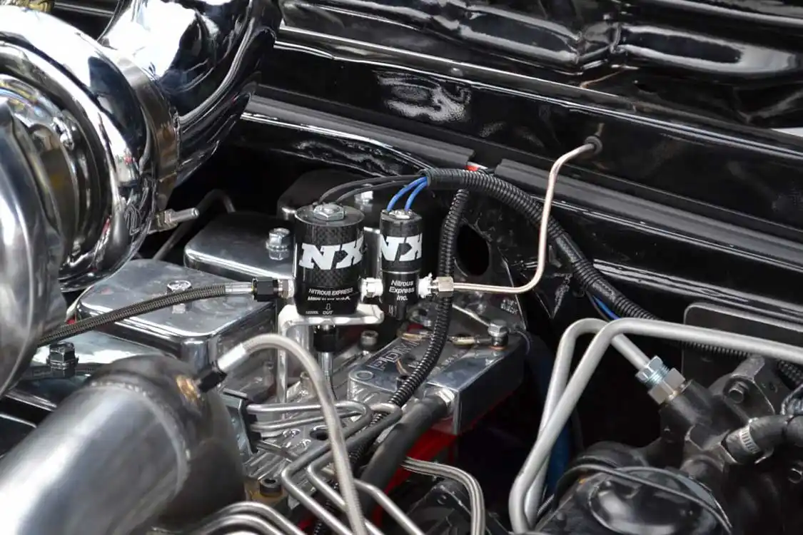 7. The small solenoid off to the right in this picture is known as a purge solenoid; it's used to bleed off excess bottle pressure or to get any air out of the system. Purge solenoids can also be used to inject nitrous into the engine, but those don't really flow enough to make a big difference.