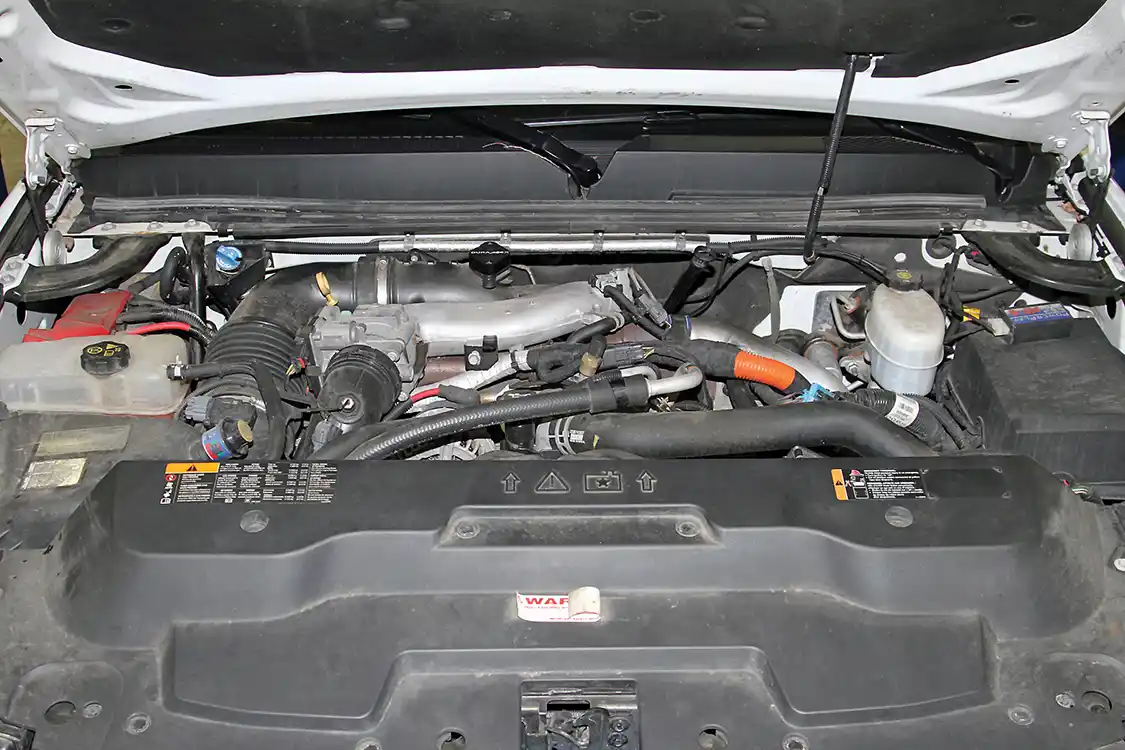 20. While it certainly doesn’t qualify as a sexy engine, it does look better with the PCV rerouted and the big plastic resonator replaced with the billet aluminum block off plate.