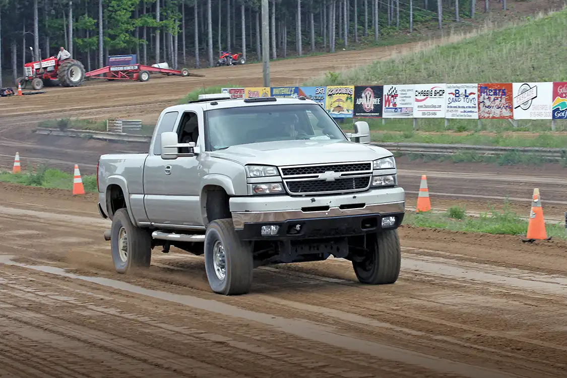 Bucky Raspotnik drove his 2006 Chevy Silverado to the final round win in the DOT Class, making low 6-second passes and tripping the win light round after round.