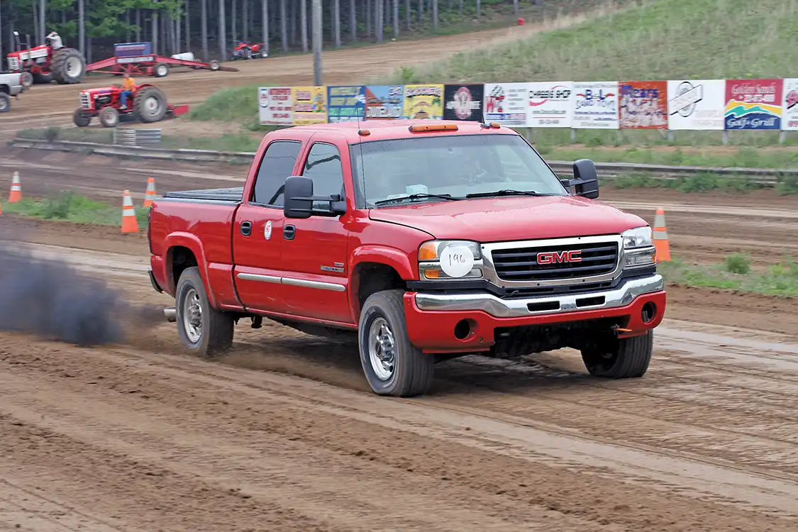 “Producer Steve” McKiernan from the “Free Beer & Hot Wings” radio show, greatly improved his drag racing skills from last year, making it all the way to the semifinal round of eliminations in Joe Beaudoin’s GMC Sierra.