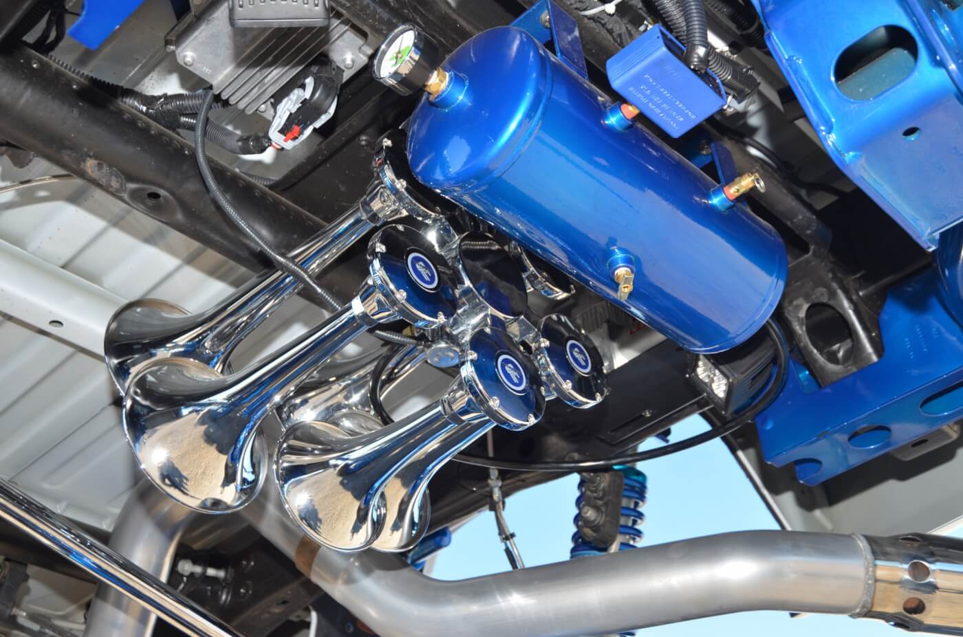 The chrome Admiral 540 Train Horn Kit from Horn Blasters, with air tank and VIAIR compressor to charge the system.