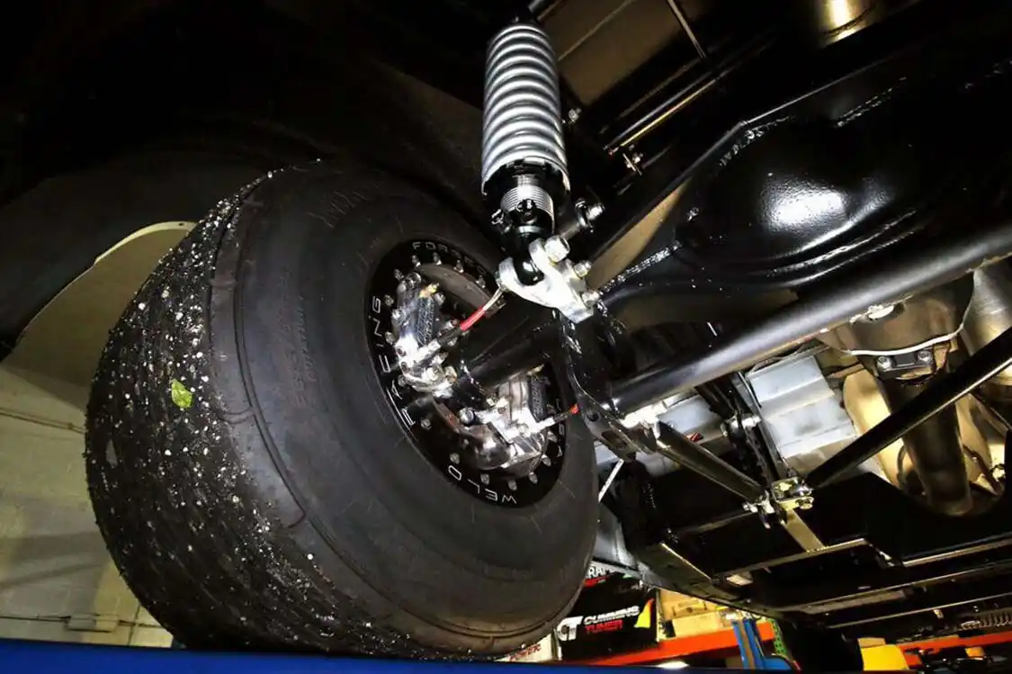 Out back a custom 9-inch rear-end gets the power to the ground. It's held in place by a 4-link build by TDS and is sprung by a set of QA-1 coilovers.