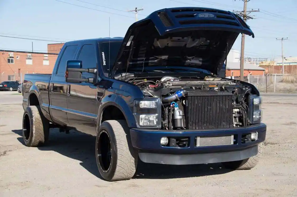 The F250 runs a host of aftermarket pieces engineered and produced by Maryland Performance Diesel of Baltimore, Md. Hiding behind the bumper is the remote oil cooler that helps keep that fully-built MPD engine running cool, even under heavy abuse at the track.