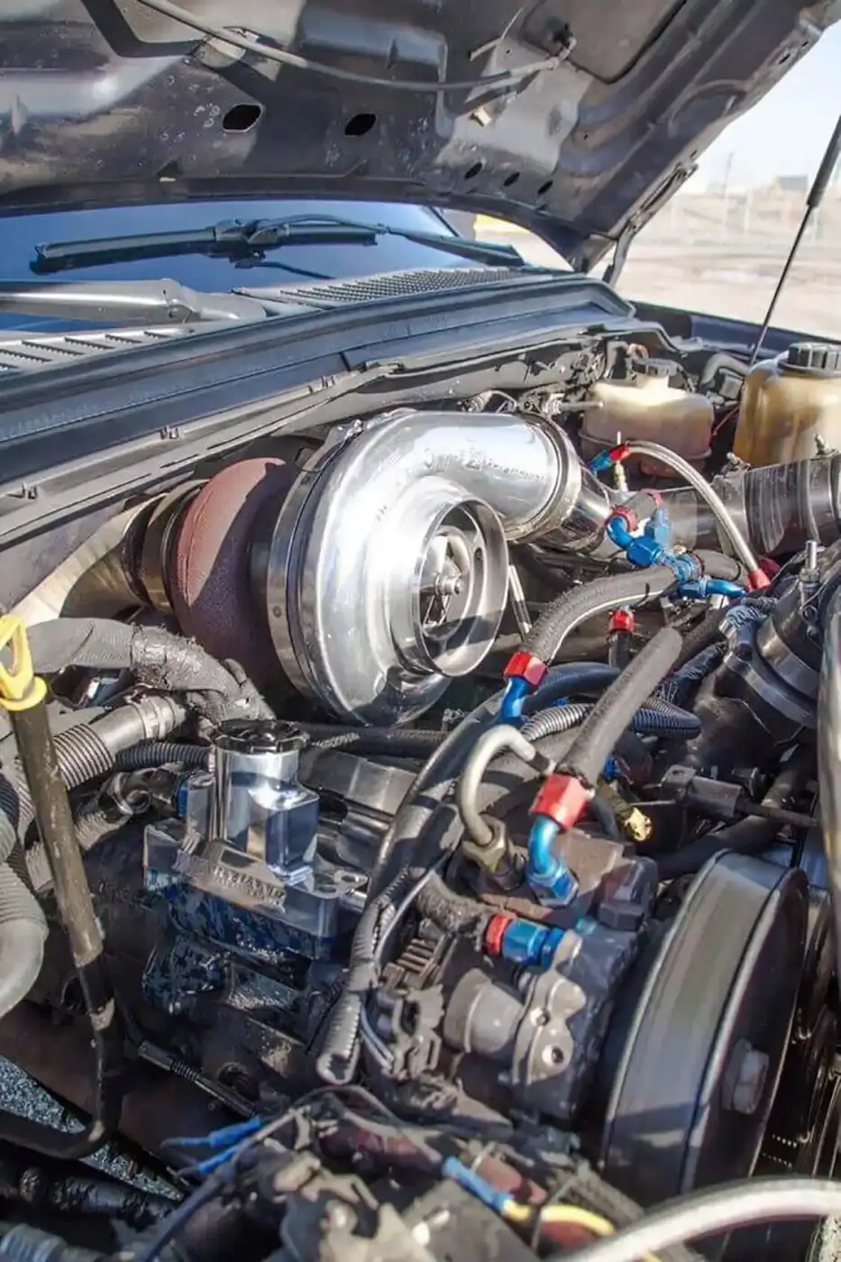 Under the hood you'll find plenty of aftermarket parts helping that 6.4L Power Stroke put down more than 1,000hp on fuel only. The MPD billet crankcase breather re-route kit, River City Diesel Duel Fueler Kit, and Forced Inductions 76mm ETR turbo are key parts to the truck's build.