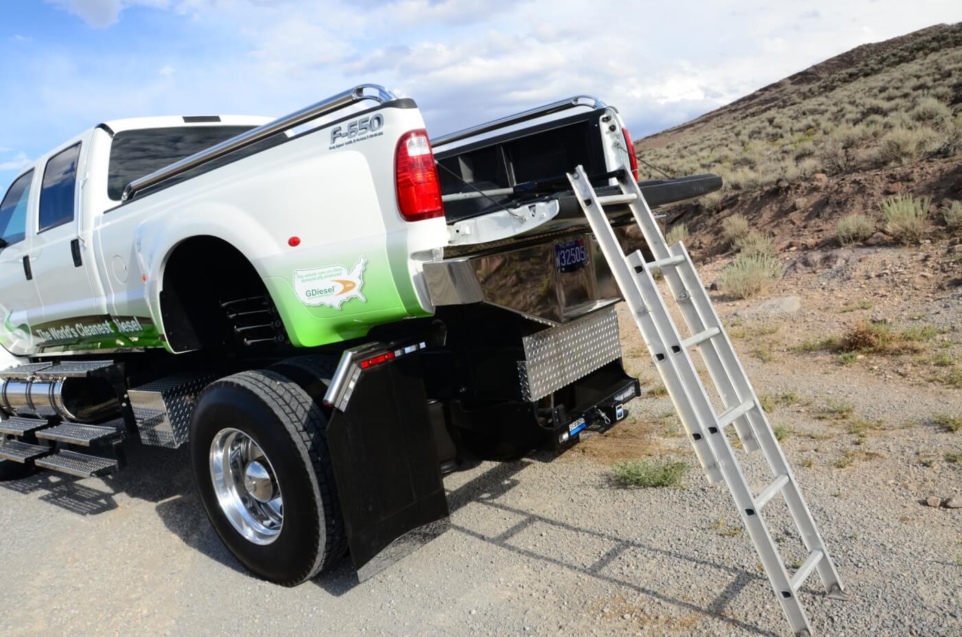 A folding ladder stored on the tailgate provides much-needed access to the pickup bed, which is nearly a foot above the main frame rails.