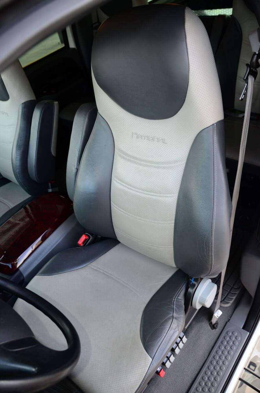 National’s posh leather upholstery with perforated inserts dresses up the cockpit.