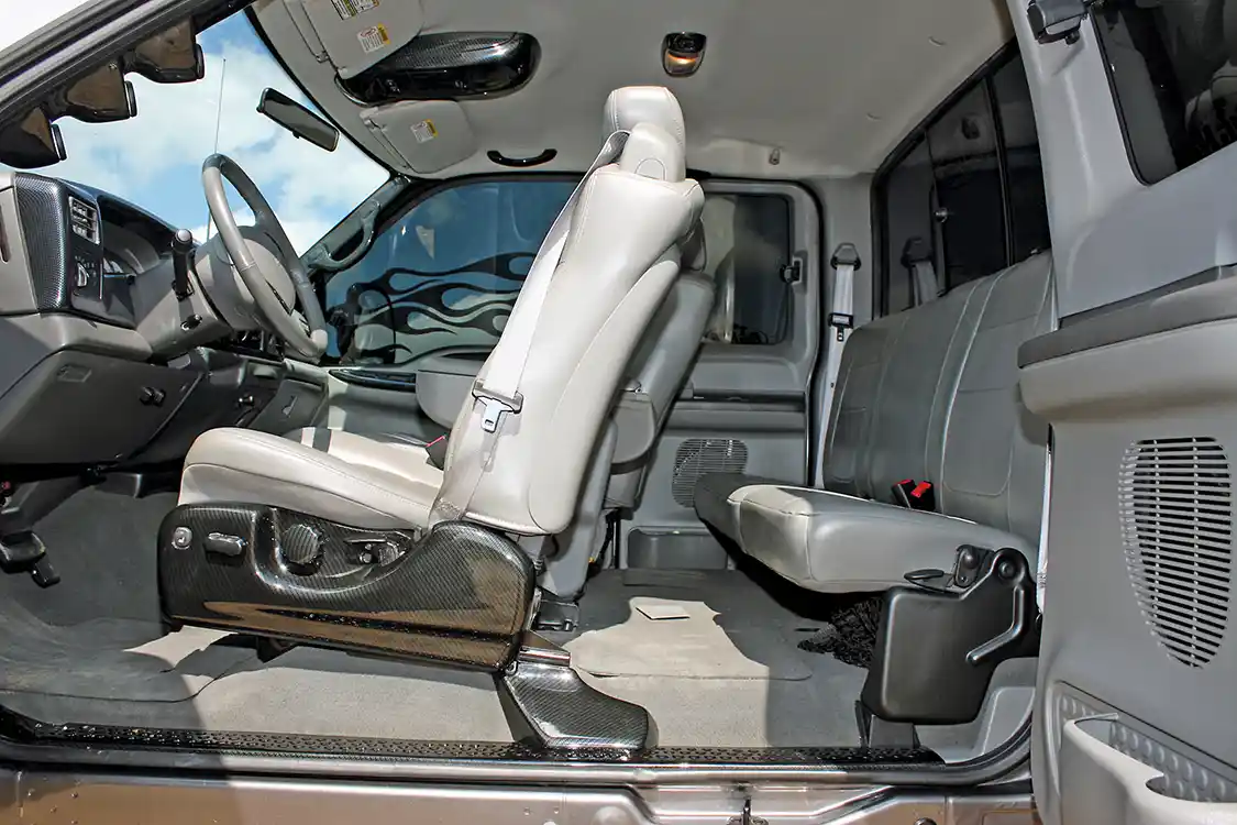 While the gray leather is still stock, just about anything that could be removed was treated to the carbon fiber graphics that carry over from the outside of the truck.