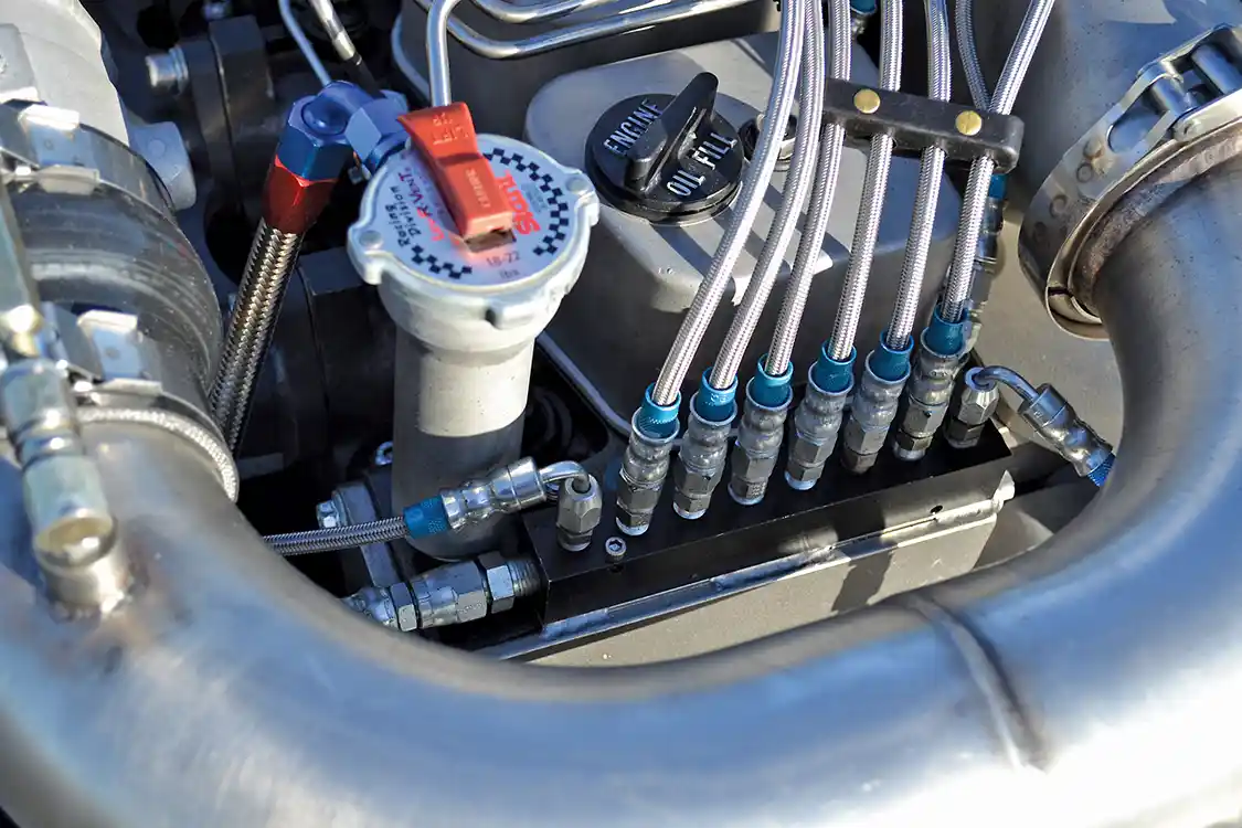 Multiple water injection nozzles are used to keep exhaust gas temperatures down, instead of an intercooler. For maximum power, EGT is limited to 1,700-1,800 degrees at the end of the quarter mile.
