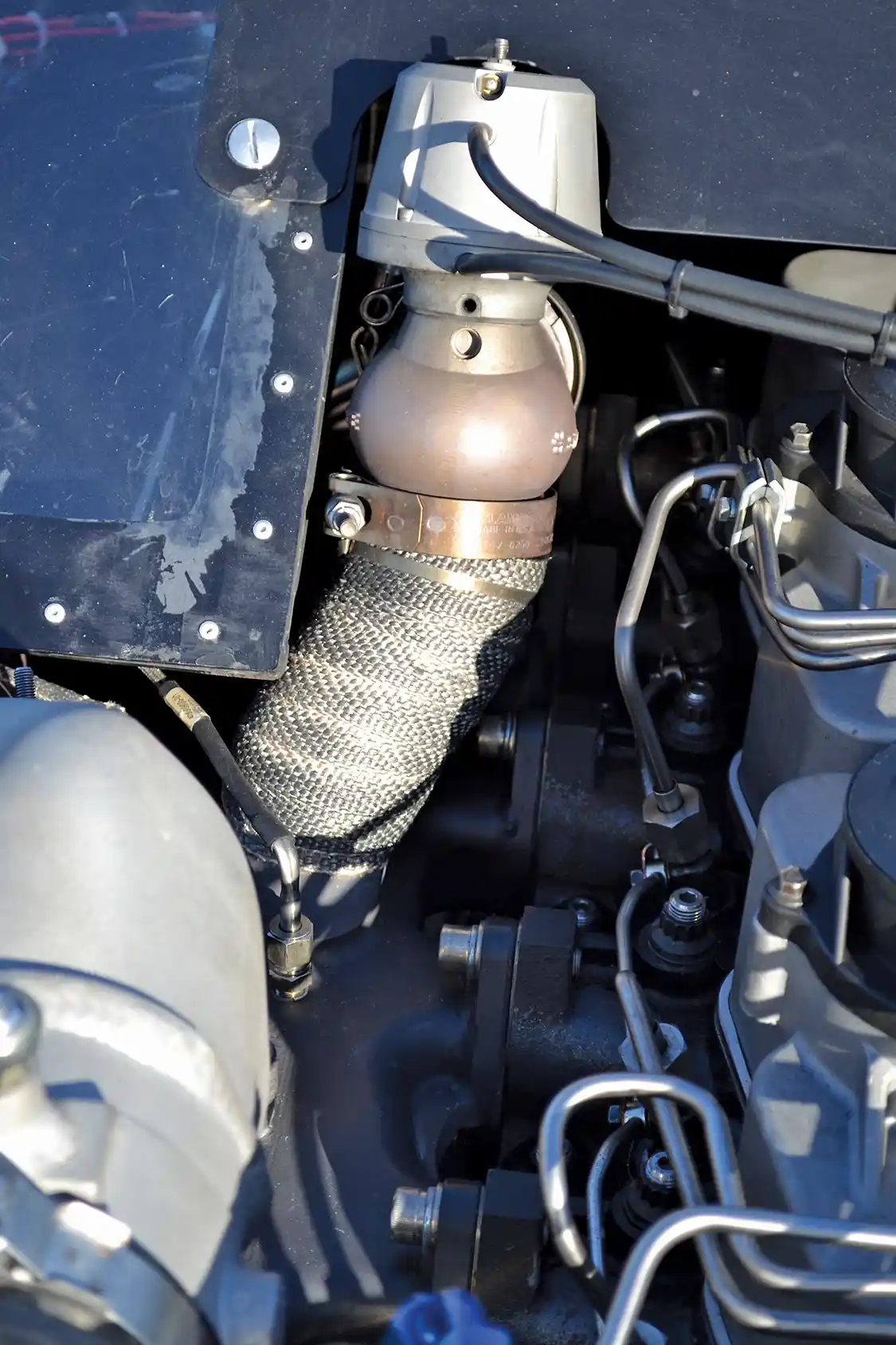 A <a href="https://steedspeed.com/">Steed Speed</a> exhaust manifold incorporates a <a href="https://synapseengineering.com/synapseusa/">Synapse</a> 50mm wastegate to relieve drive pressure and keep the engine from overboosting. The supercharger turbocharger system is currently set up at 115psi of boost, with 56psi of drive pressure, which is virtually unheard of.