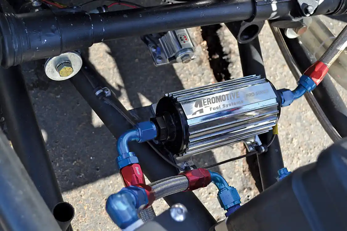 The fuel system that has to keep up with the supercharged/turbocharged engine combination starts off with an Aeromotive lift pump, which is regulated at 50psi of fuel pressure.