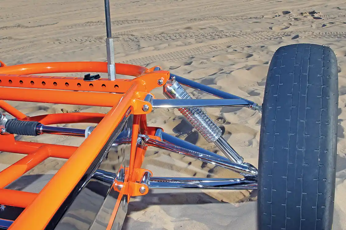 The front suspension features low profile A-arms along with polished MS Cruisers shocks to tame the bumps in the sand.