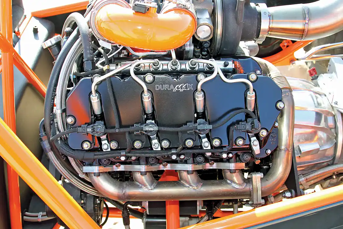 To dress up the engine, they machined a set of upper-valve covers. You can also see the stainless steel HSP headers and up pipes in this shot.