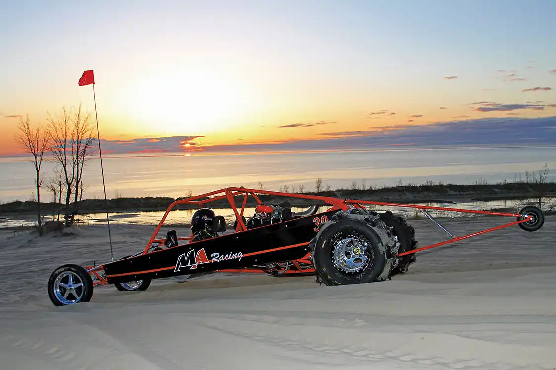 Sunset on Lake Michigan is a beautiful sight, especially if you’re a gearhead with a Duramax-powered sand rail to blast across the dunes.