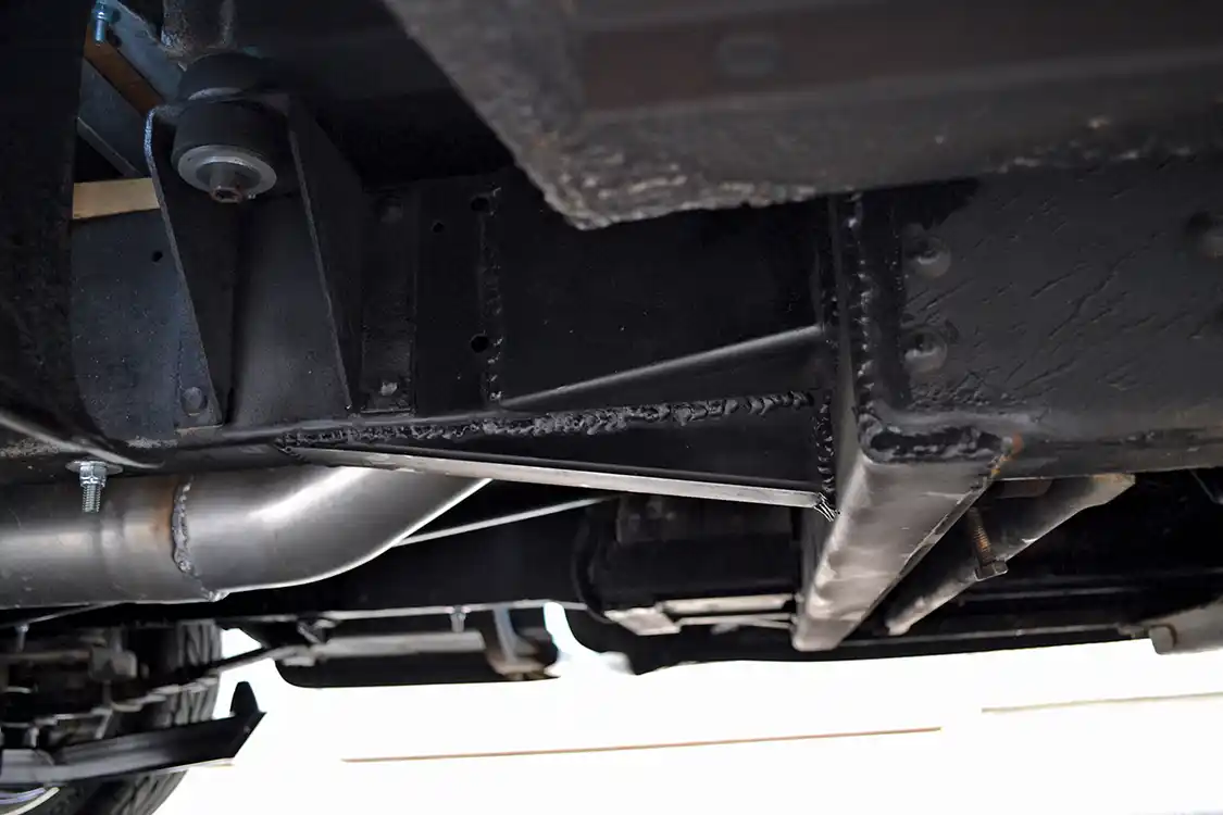 We've seen a lot of frame-chops on swapped trucks that are simple boxed connections, but since Bill is a chassis guy, he made sure he did his right. An added crossmember and boxed and triangulated reinforcements minimizes twisting or flexing action due to the diesel engine's torque.